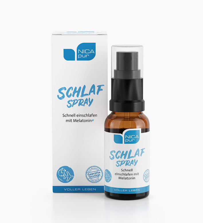 Schlaf Spray Flasche steht neben der weißen Verpackung